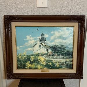 Framed Lighthouse Painting with Brown Frame